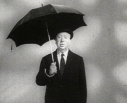 Alfred Hitchcock with umbrella