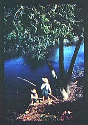 Boys fishing in a bayou in Louisiana
