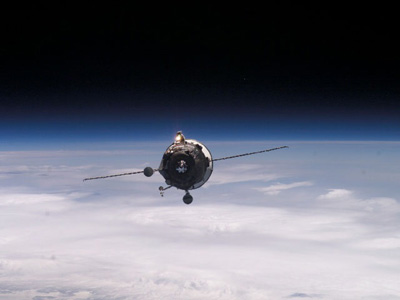 Photograph of the supply space ship approaching the International Space Station